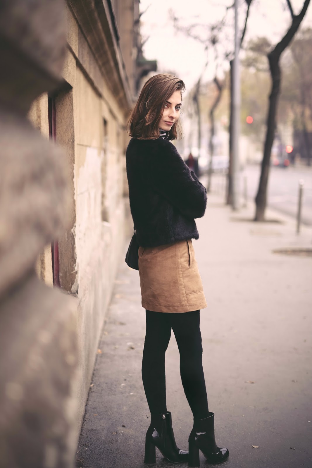 WEARING A BROWN ALINE SKIRT & WITH A STRIPED TOP What Vero Wears